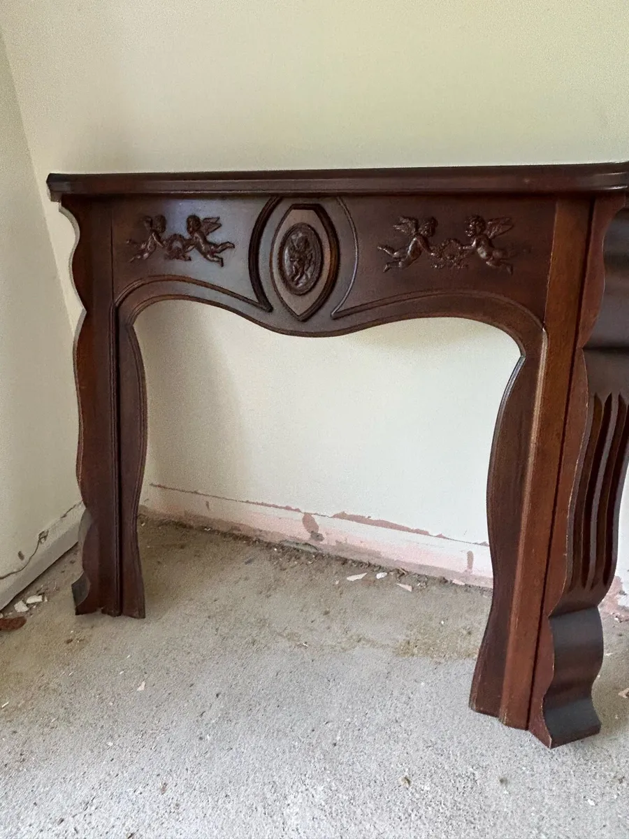 Teak fire surround