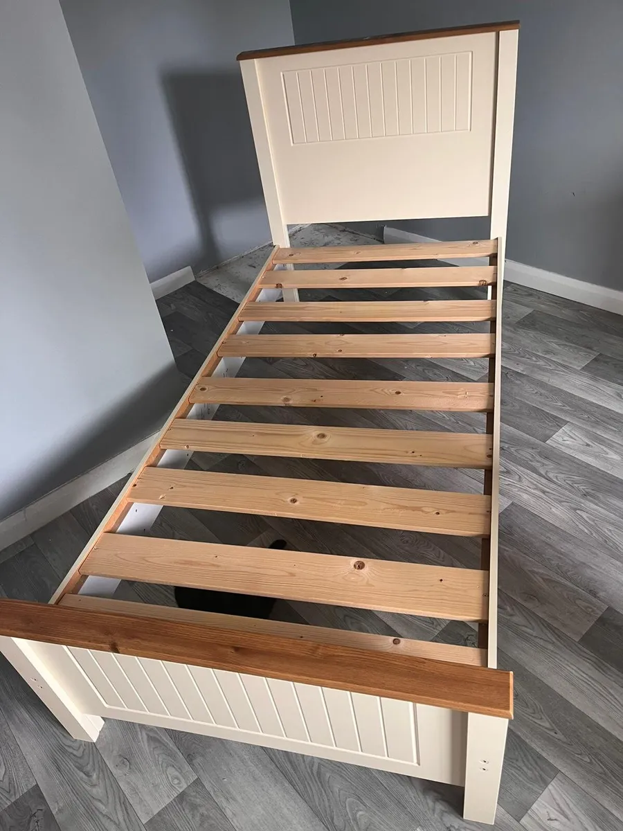 2 x single wooden bed