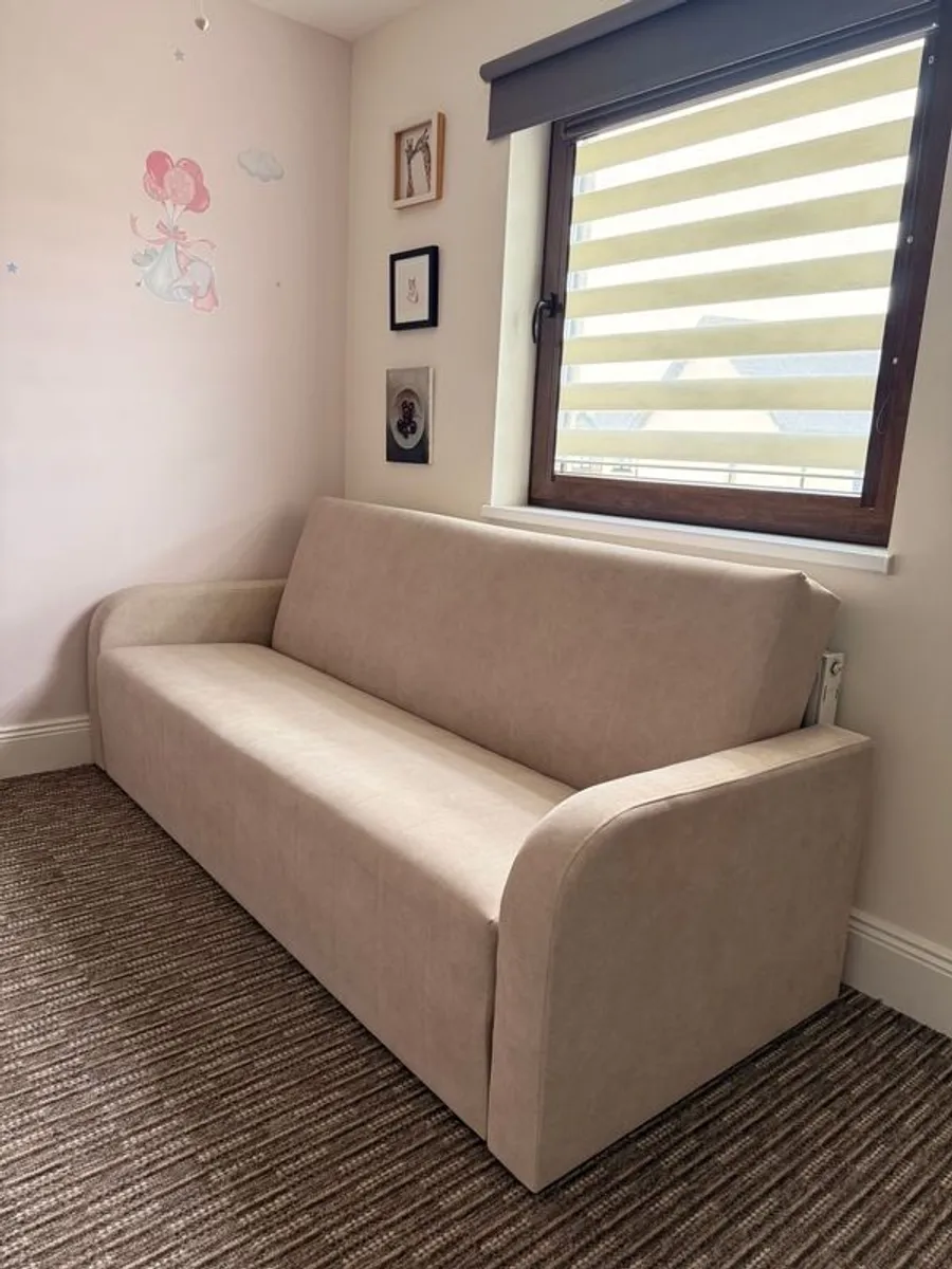 Beige sofa bed - Image 1
