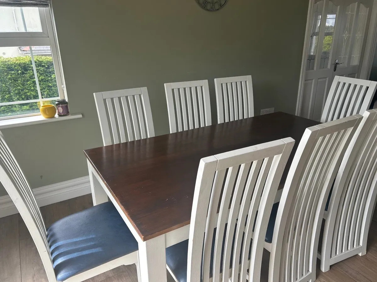 Dining table and 8 chairs - Image 1