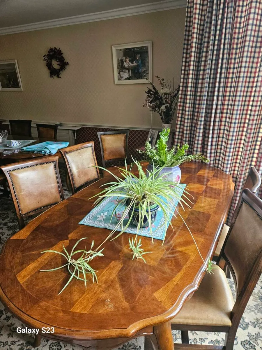 Dining table and 6 leather covered chairs