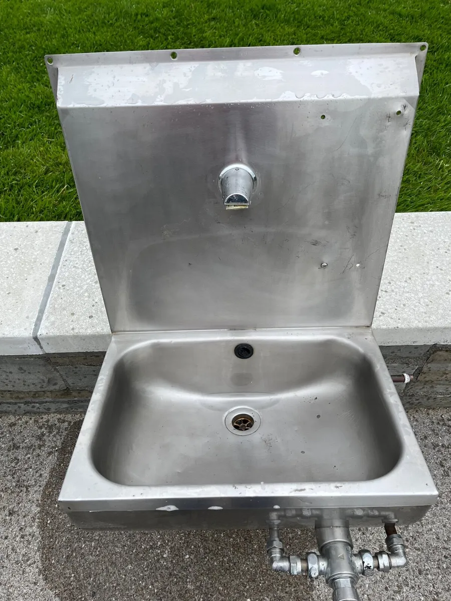 Wall mounted stainless steel sink with hands free - Image 1