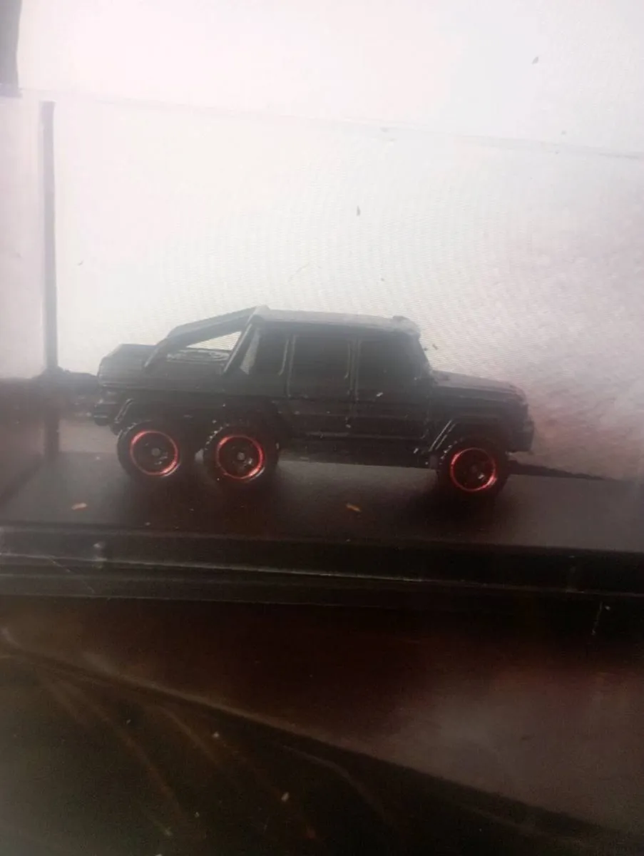 1-64 SCALES MERCEDES BENZ G63 6X6AGM BLACK DIE-CAS - Image 1