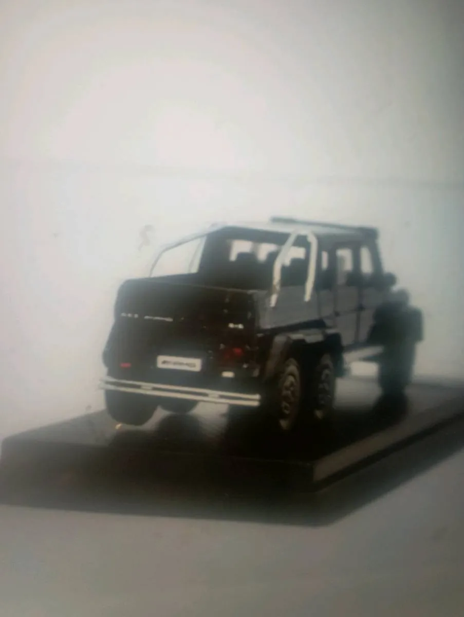 1-64 SCALES MERCEDES BENZ G63 6X6AGM BLACK DIE-CAS - Image 4