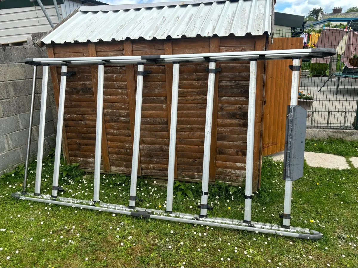 Factory rhino aluminium roller roof rack like new - Image 1