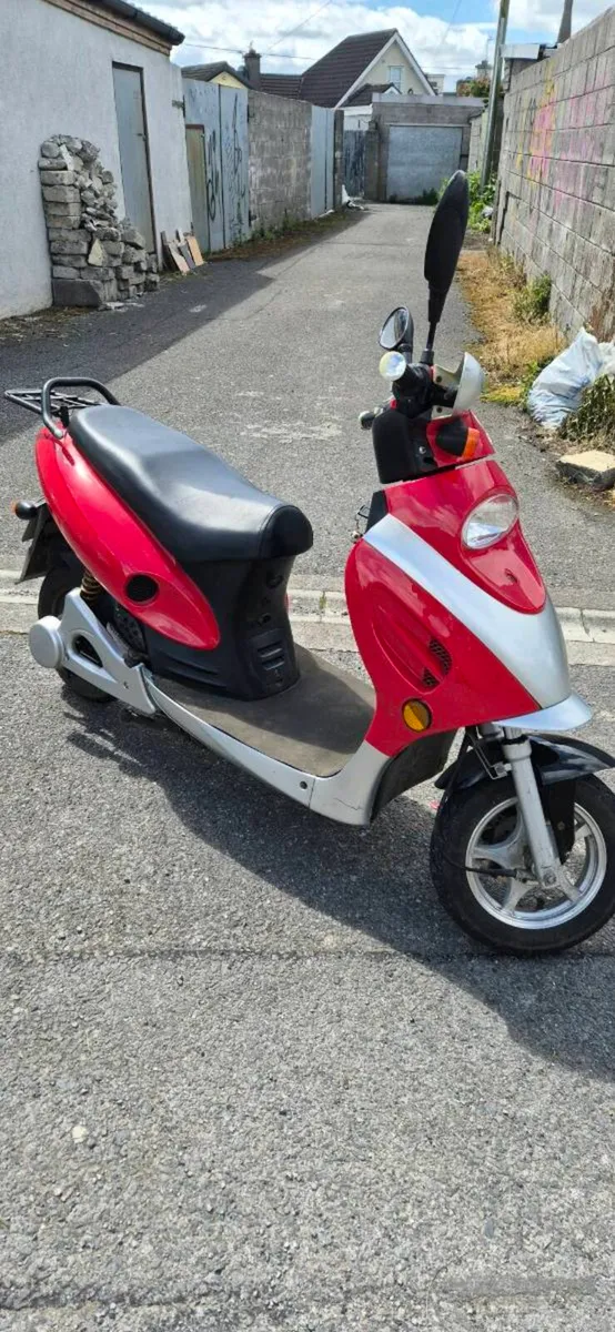 UGO electric motorcycle - Image 1