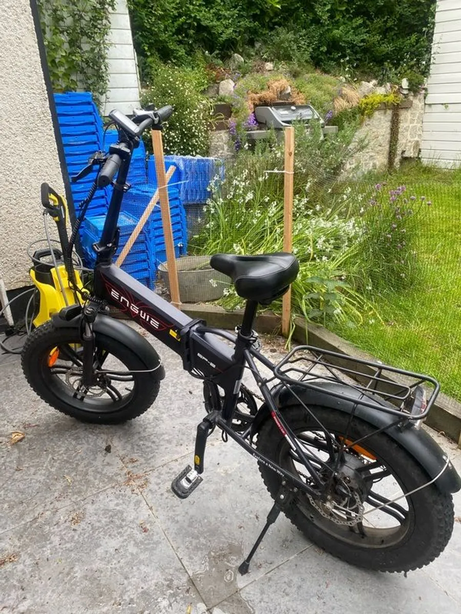 Electric enguie boost folding bike - Image 1