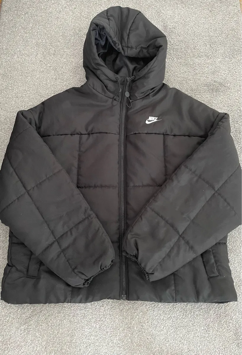 Nike women’s puffer jacket large - Image 1