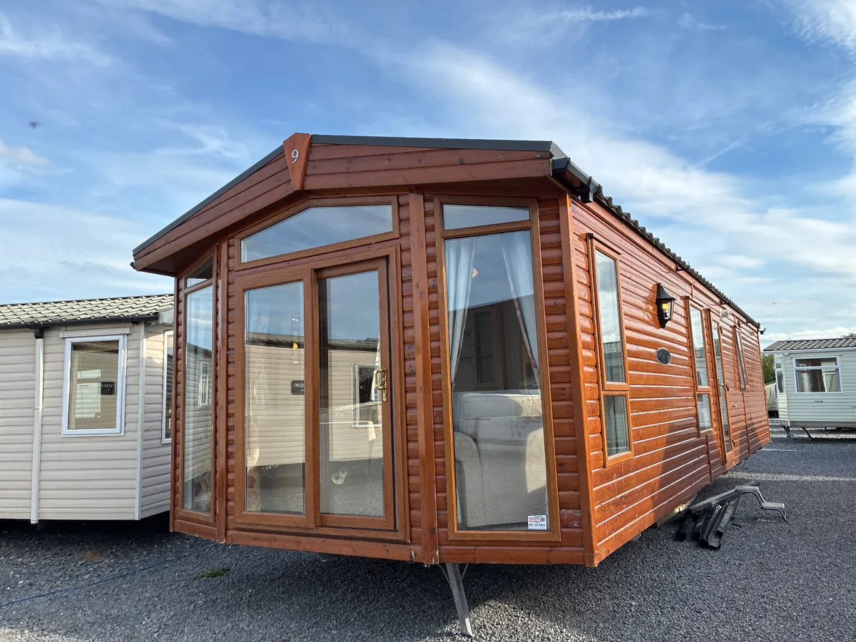SPECTACULAR RESIDENTIAL SPEC LOG CABIN ON WHEELS. - Image 1