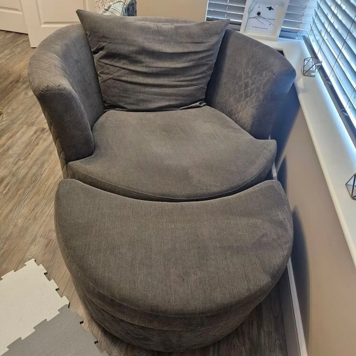 DFS Swivel chair with footstool - Image 1