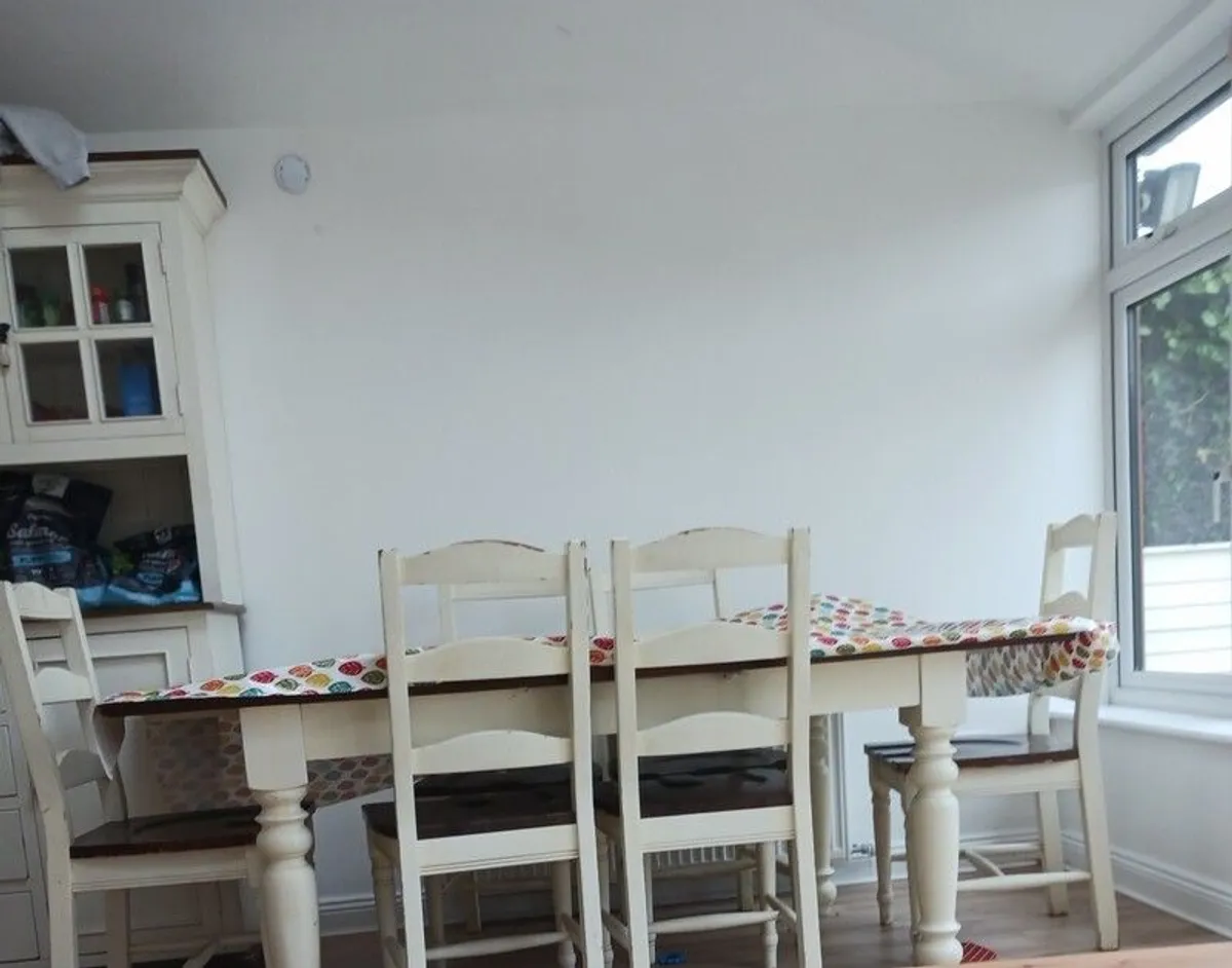 7ft farmhouse dining tabke and 6 chairs. Sine markings as well used over years. Very sturdy. Selling as downsizing. - Image 1