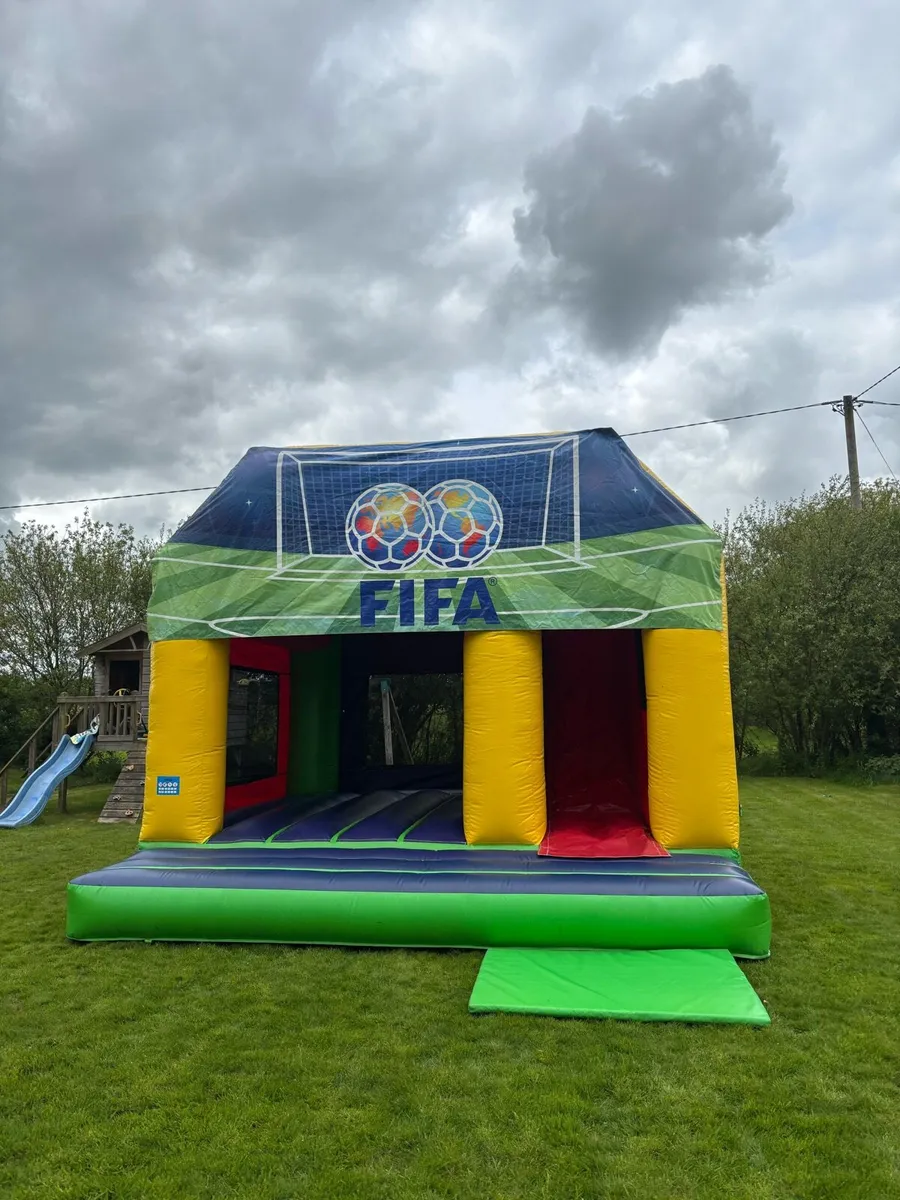Extra large bouncy castle with slide 16.5ft x 16.5 - Image 1