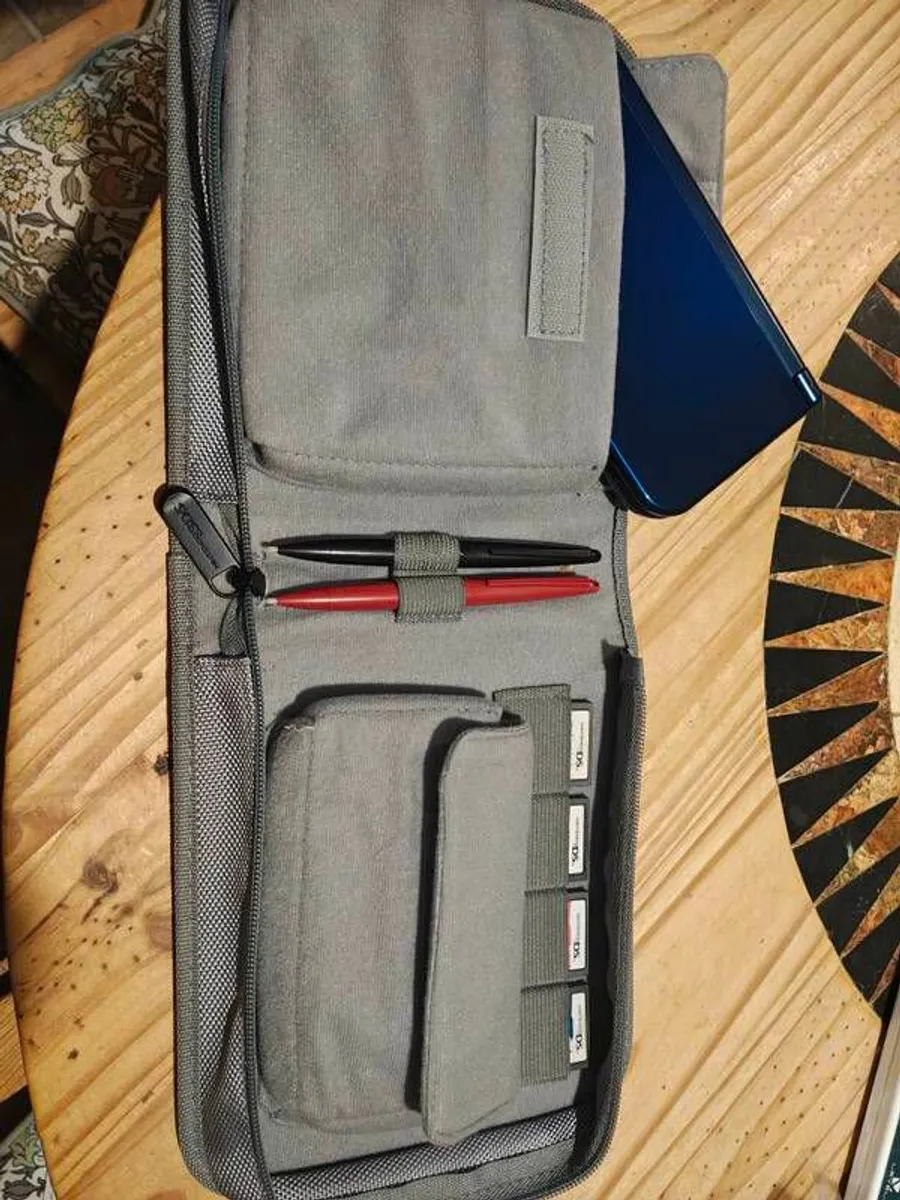 Nintendo 3ds xl with 24  games and pouch and pens - Image 2