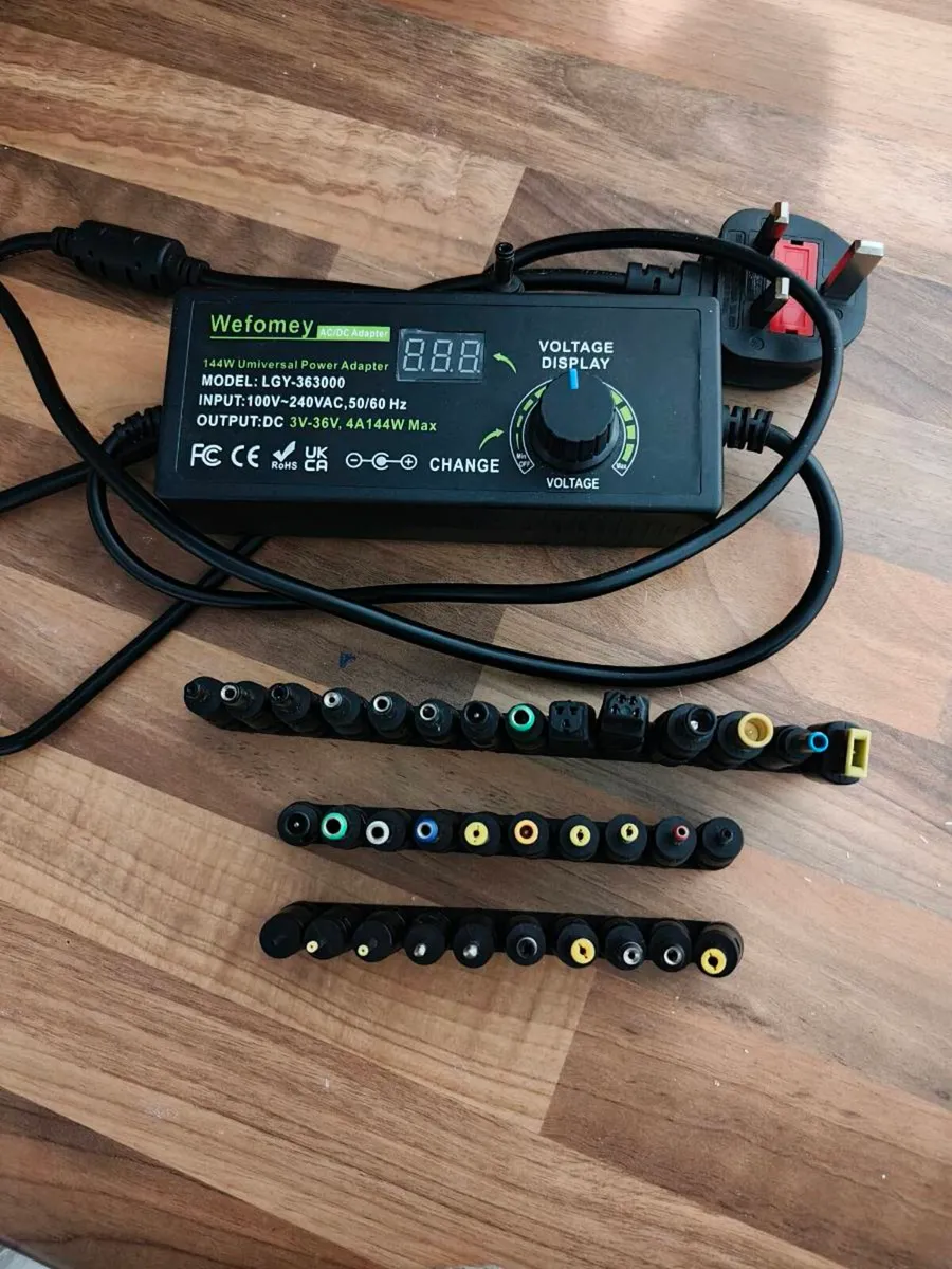 ac/dc 3-36 volt 4amp 144watt charger numerous head