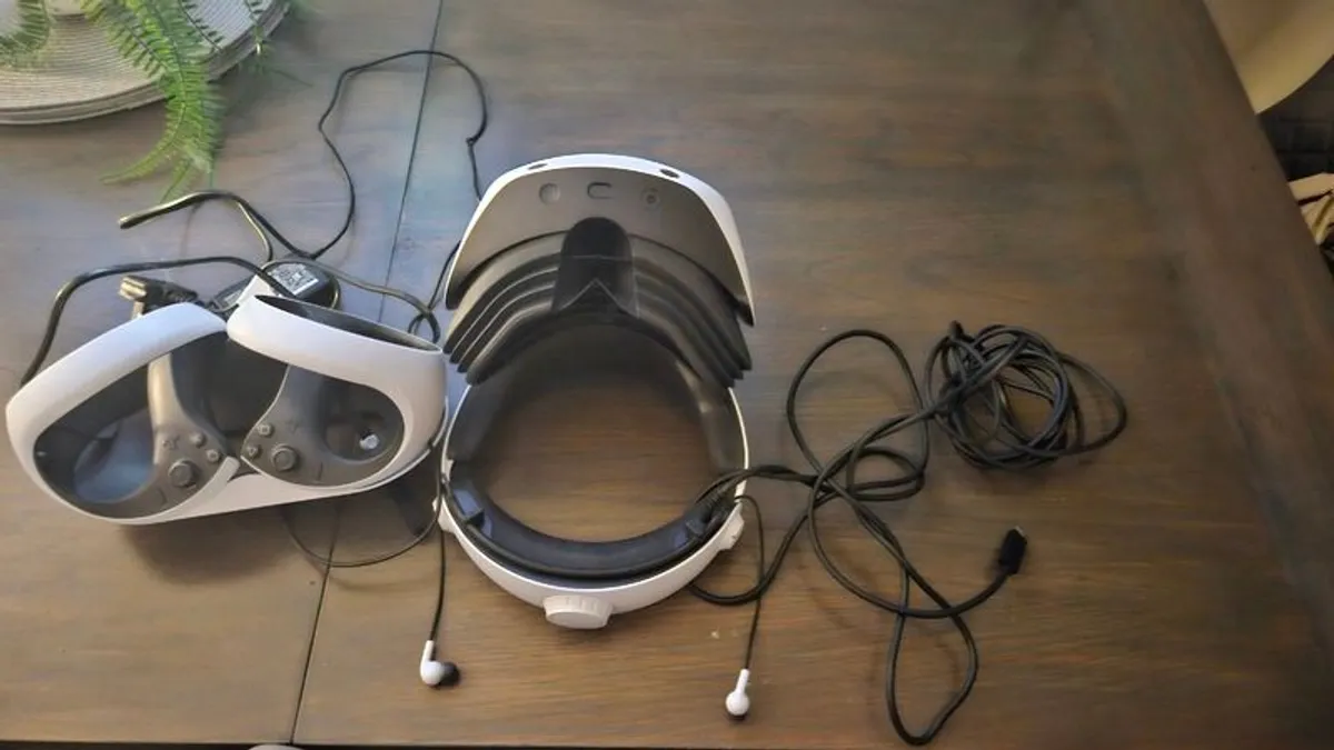 Ps5 VR Headset and hand controls with charging port.