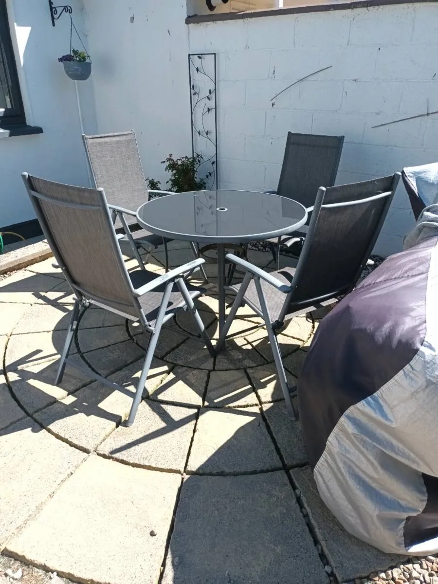 Patio table and chairs - Image 1