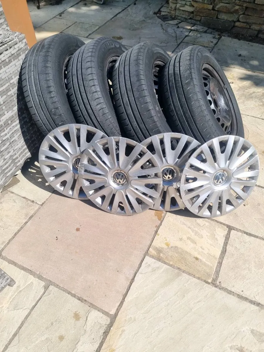 Set of 2010 vw golf wheels tyres and trims - Image 1
