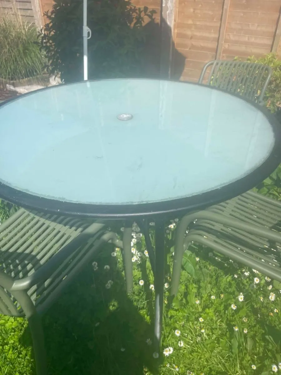 4 chairs table with glass parosol and fire pit - Image 3