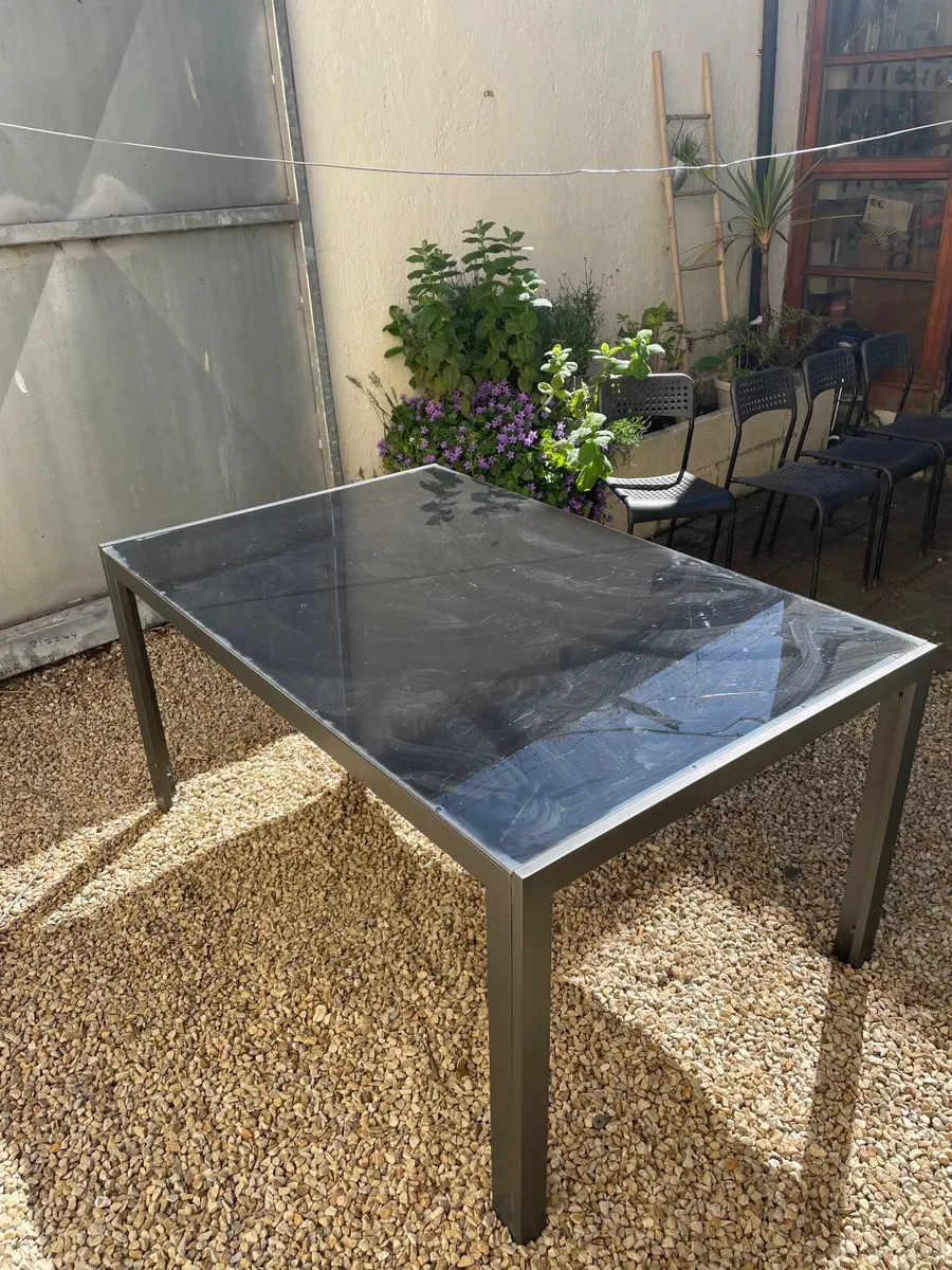 Outdoor dining table and four chairs - Image 1