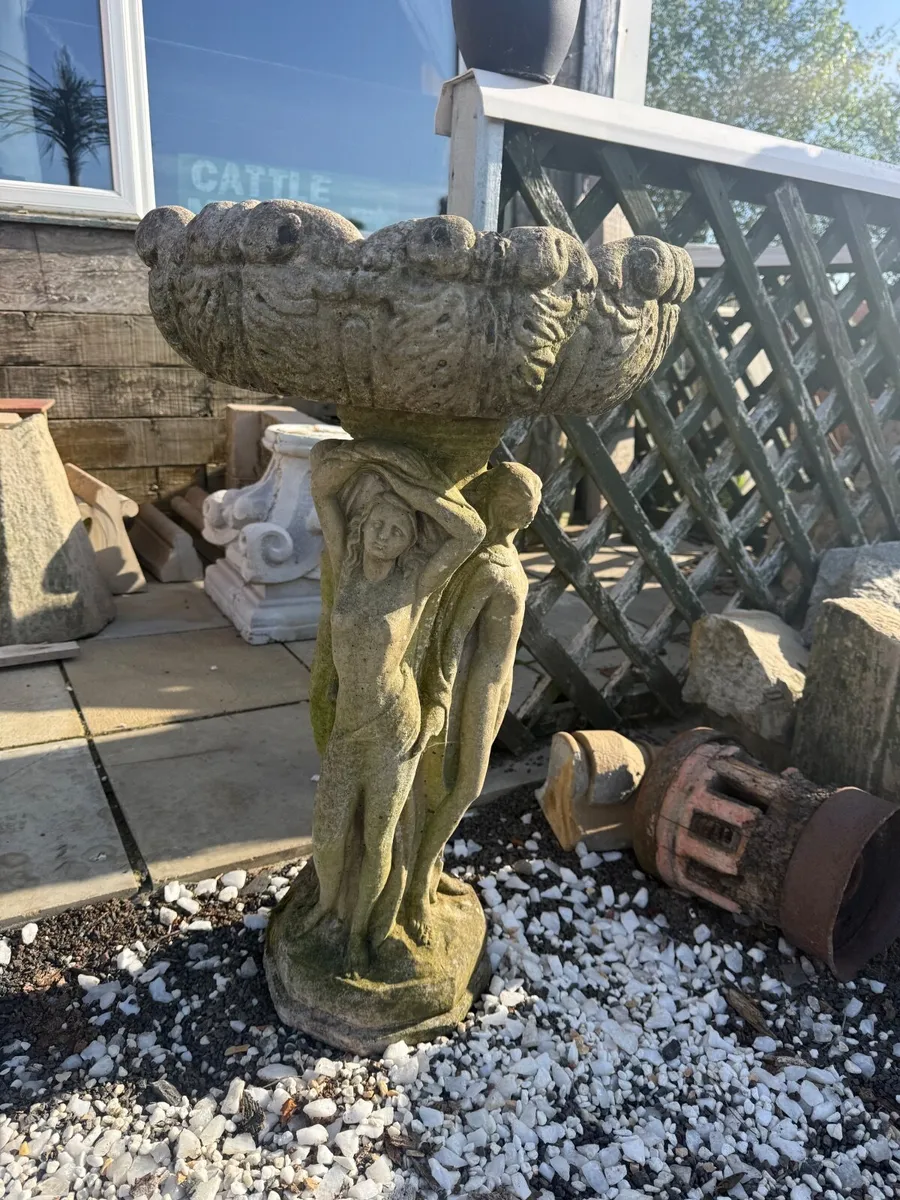 Weathered concrete fountain or birdbath. - Image 1