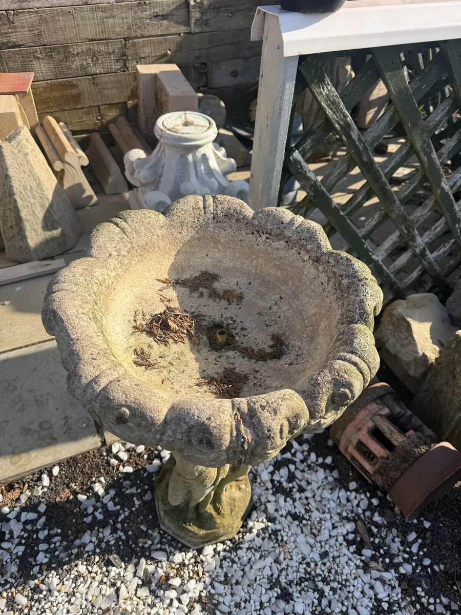 Weathered concrete fountain or birdbath. - Image 2