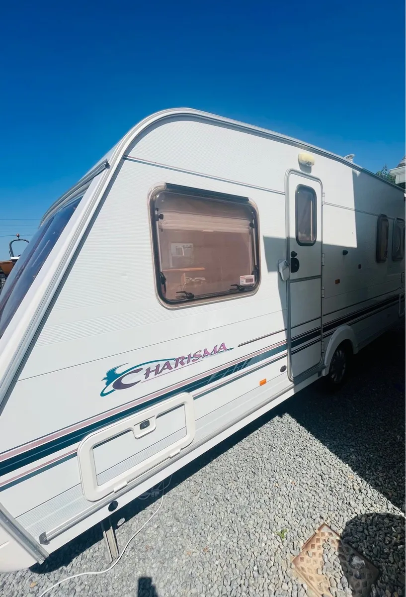 Swift  charisma 550 with fixed bed - Image 1