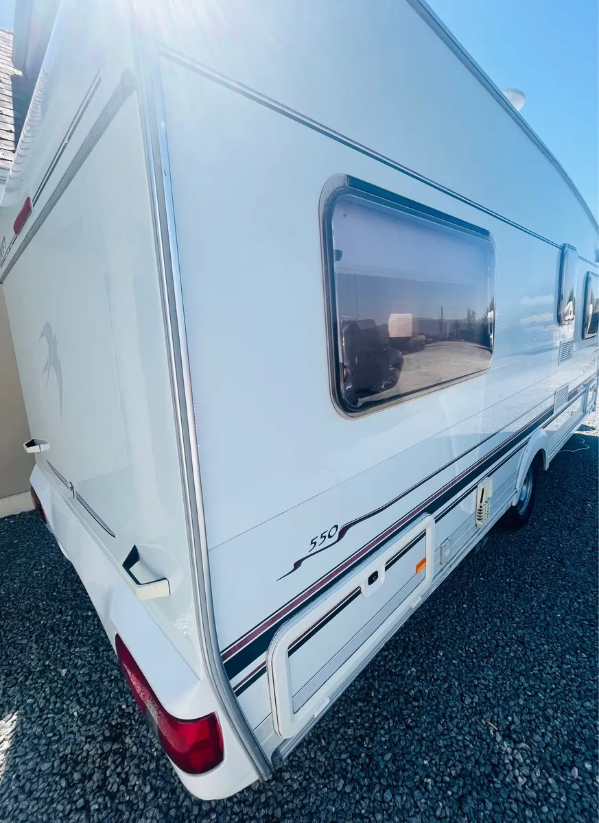 Swift  charisma 550 with fixed bed - Image 2