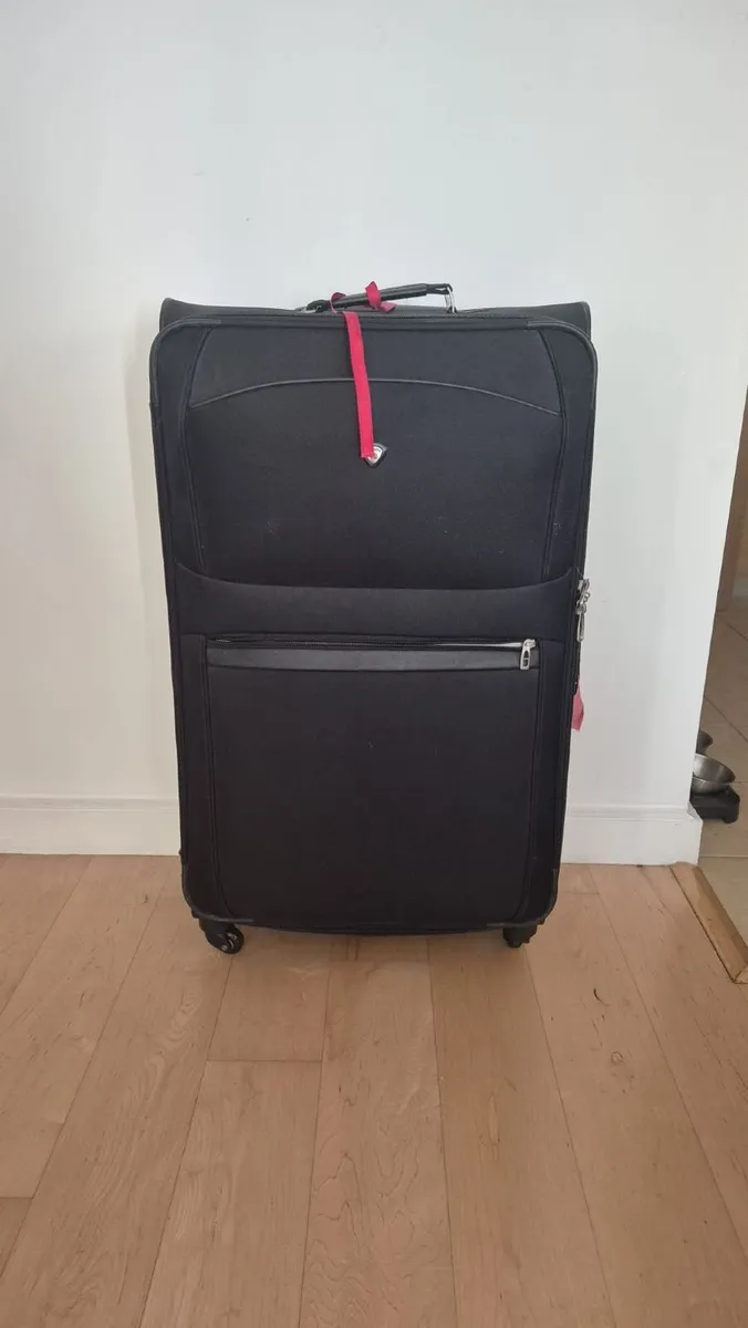 Very large black suitace - Image 1