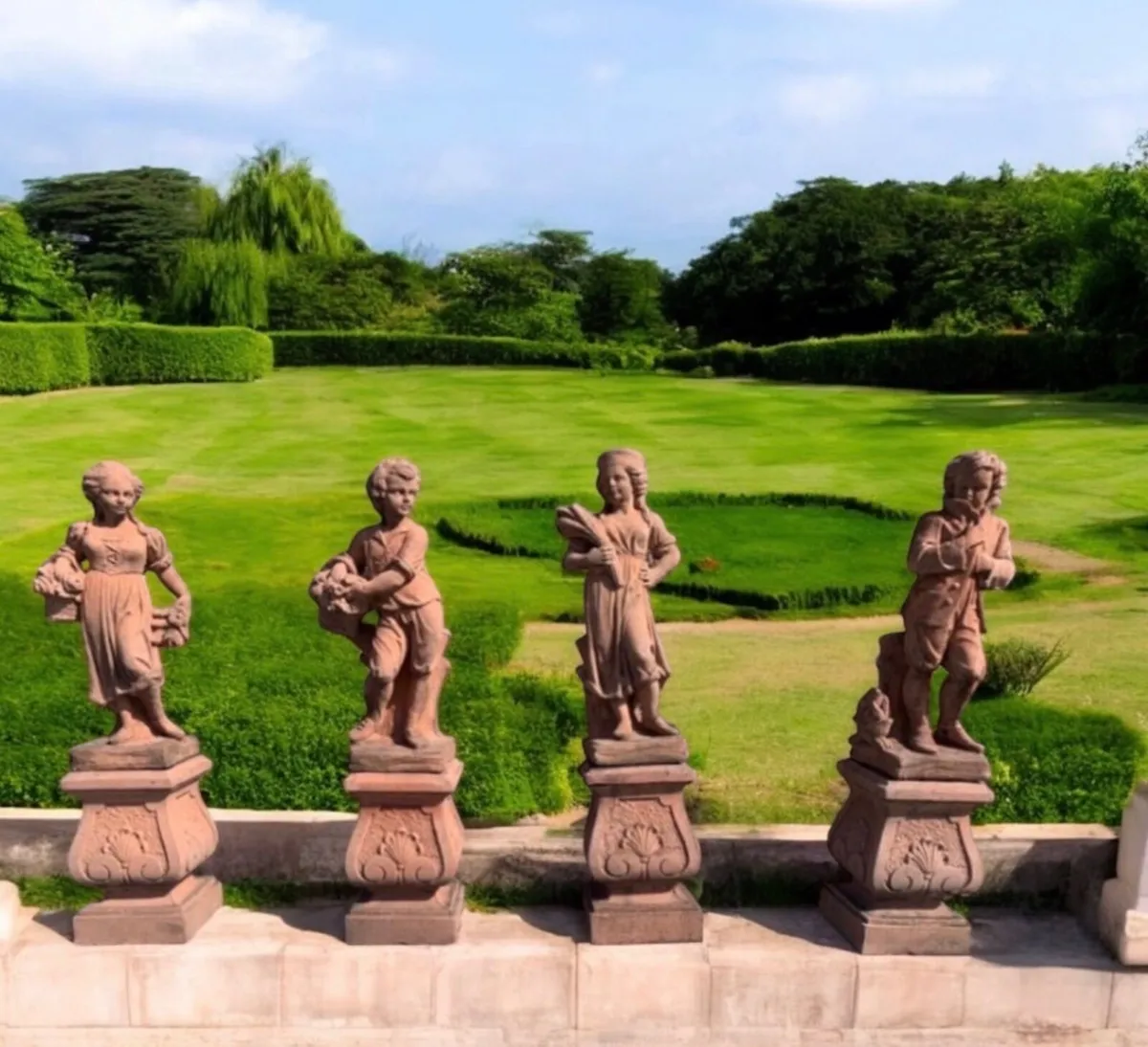 Set of four Terrocatta season statues