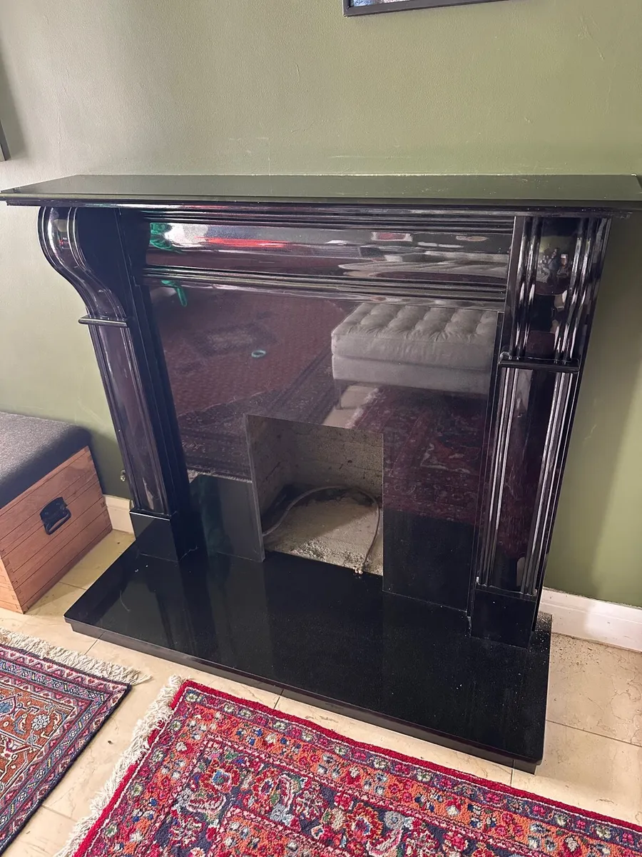 Fireplace surround in black marble