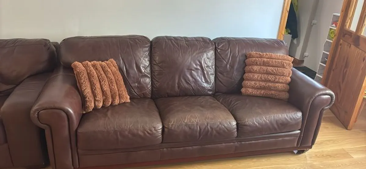 Brown leather 3 seater and 1 seater - Image 1