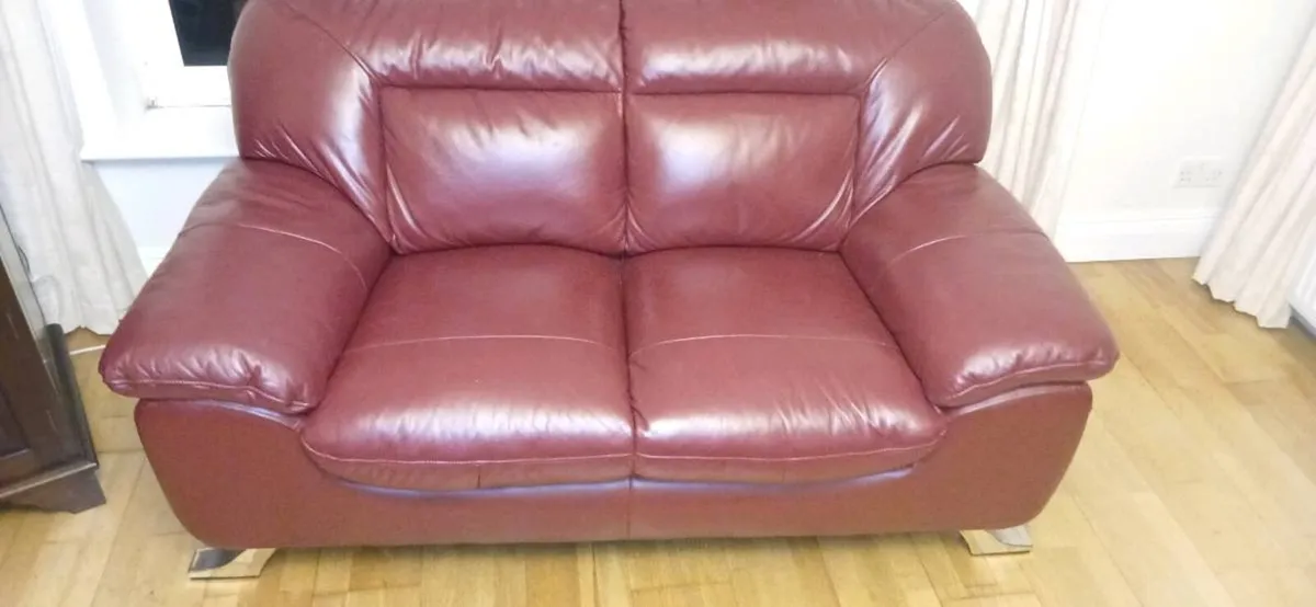 Red 2 seater leather couch - Image 1