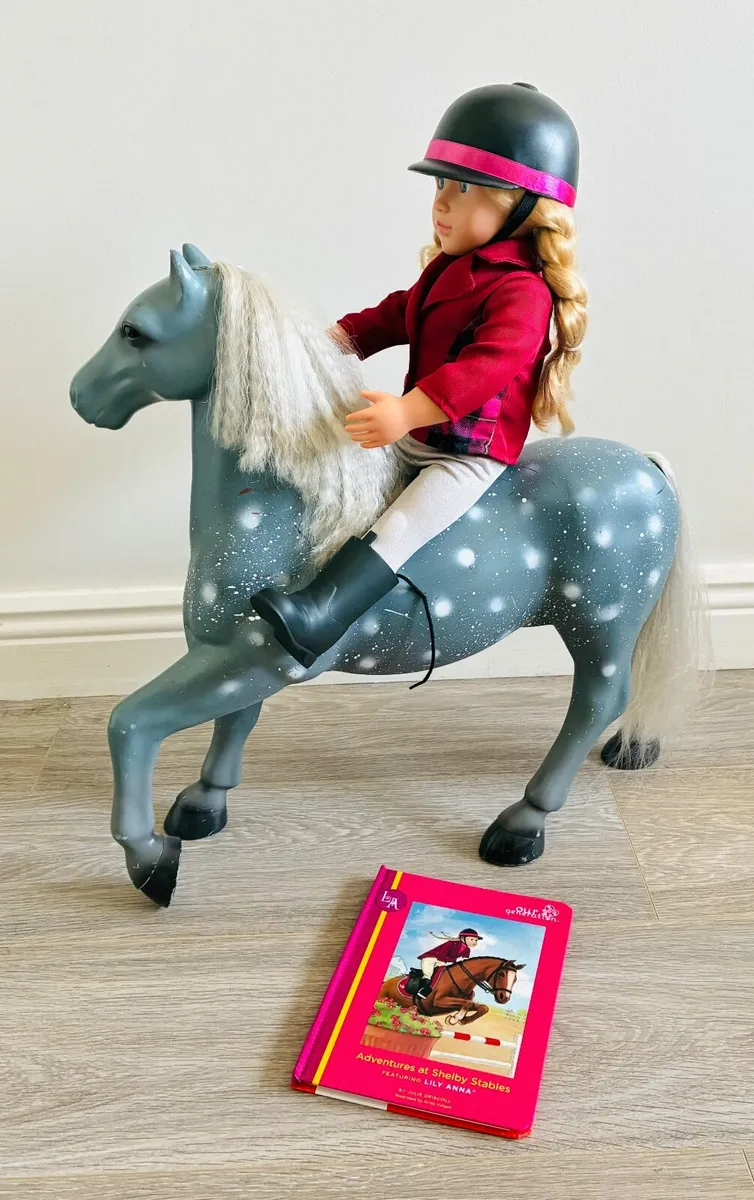 Our Generation Lily Anna deluxe doll riding a gray - Image 1