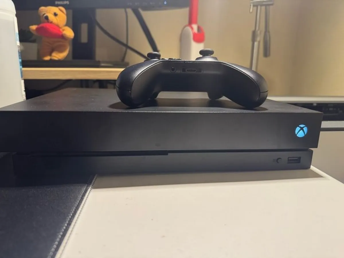xbox one x 1tb with genuine controller - Image 1