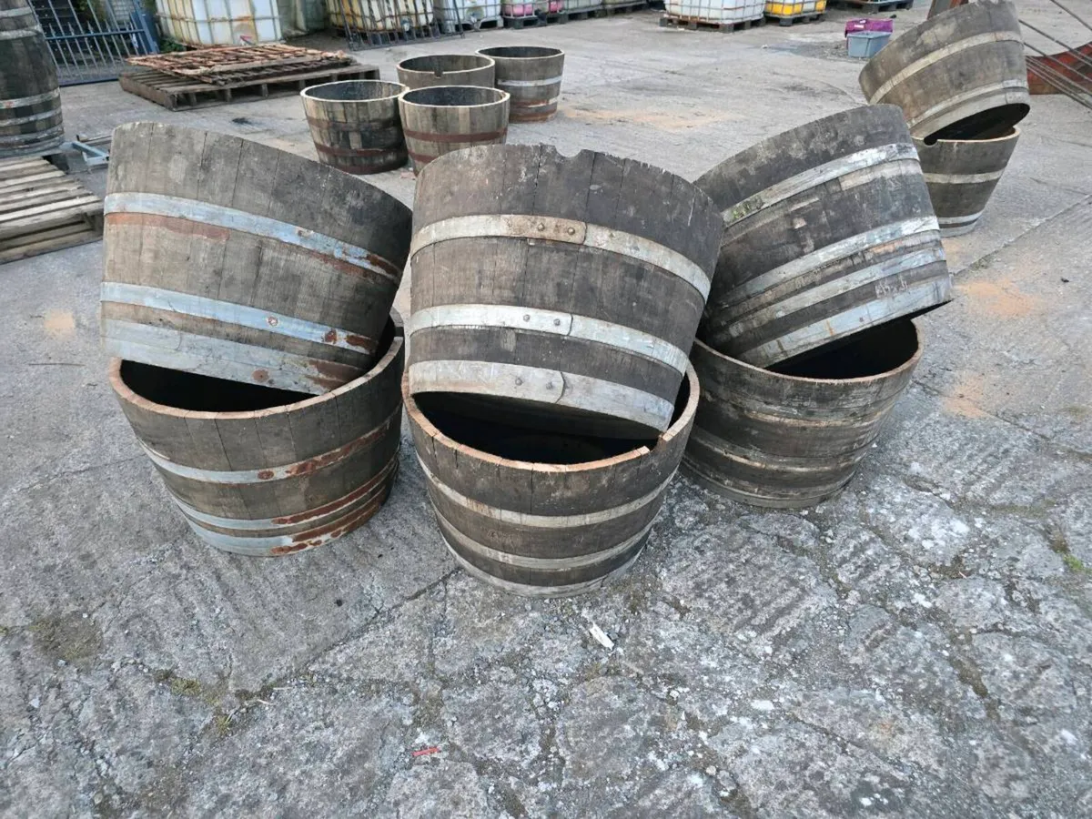 Reclaimed Whiskey Barrel Planters - Image 1