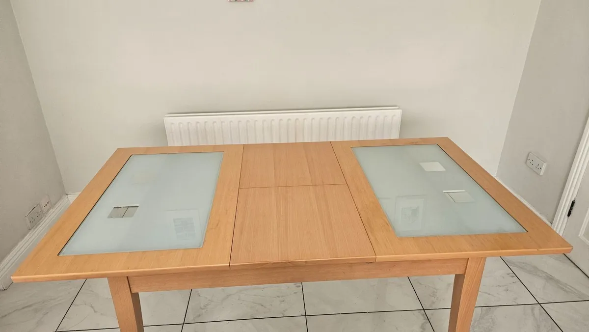 Extendable Light Wood Dining Table with Glass Pane - Image 1