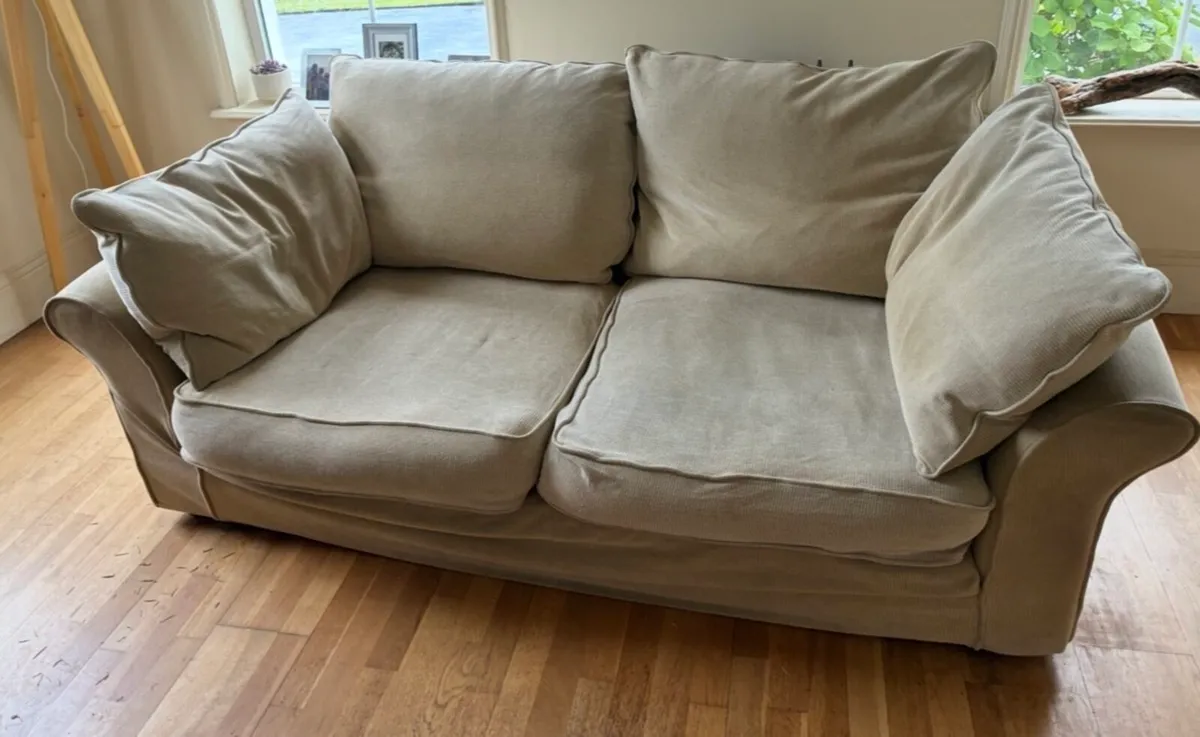 Beige two seater couch - Image 1
