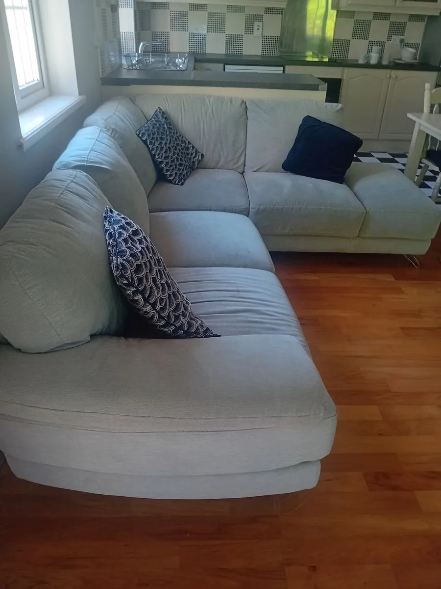 Grey couch and matching swivel seat - Image 1