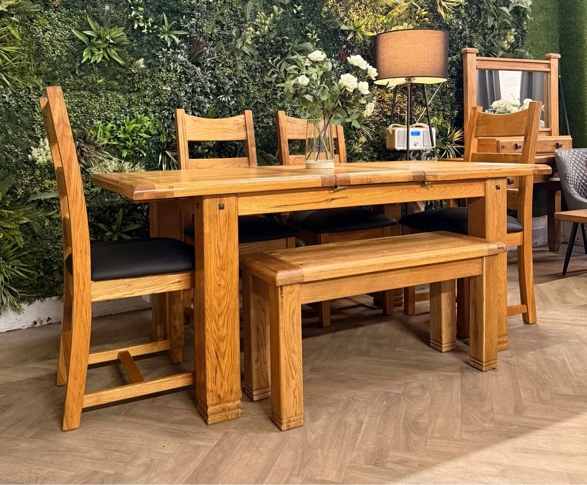 Extending oak kitchen table, 4 chairs & bench - Image 1