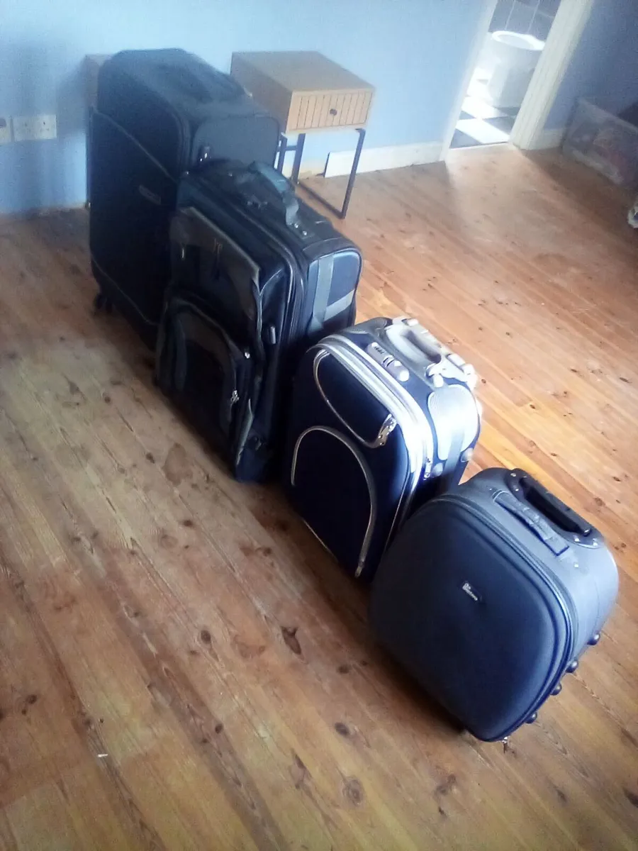 Four suitcasrs - Image 1