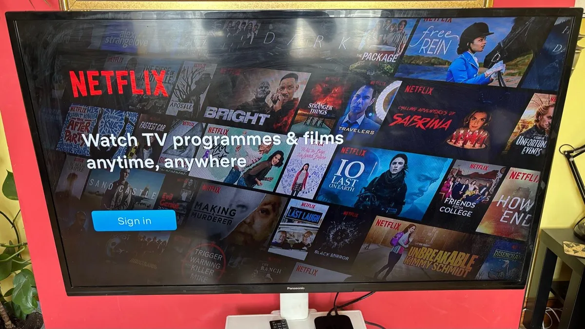 50” Panasonic TV and Apple TV box - Image 1