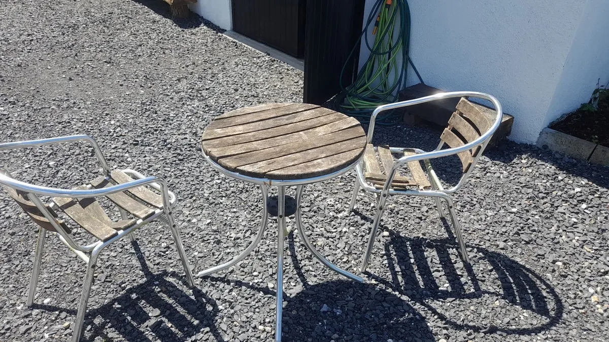 Patio table and chairs - Image 1