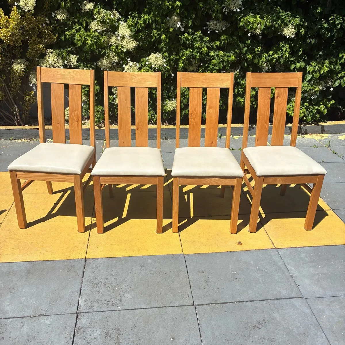 4 solid Oak Chairs with cream Leather seats - Image 1