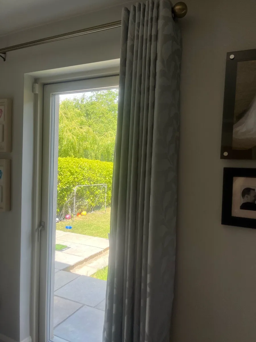Set of two eyelet curtains and poles - Image 3