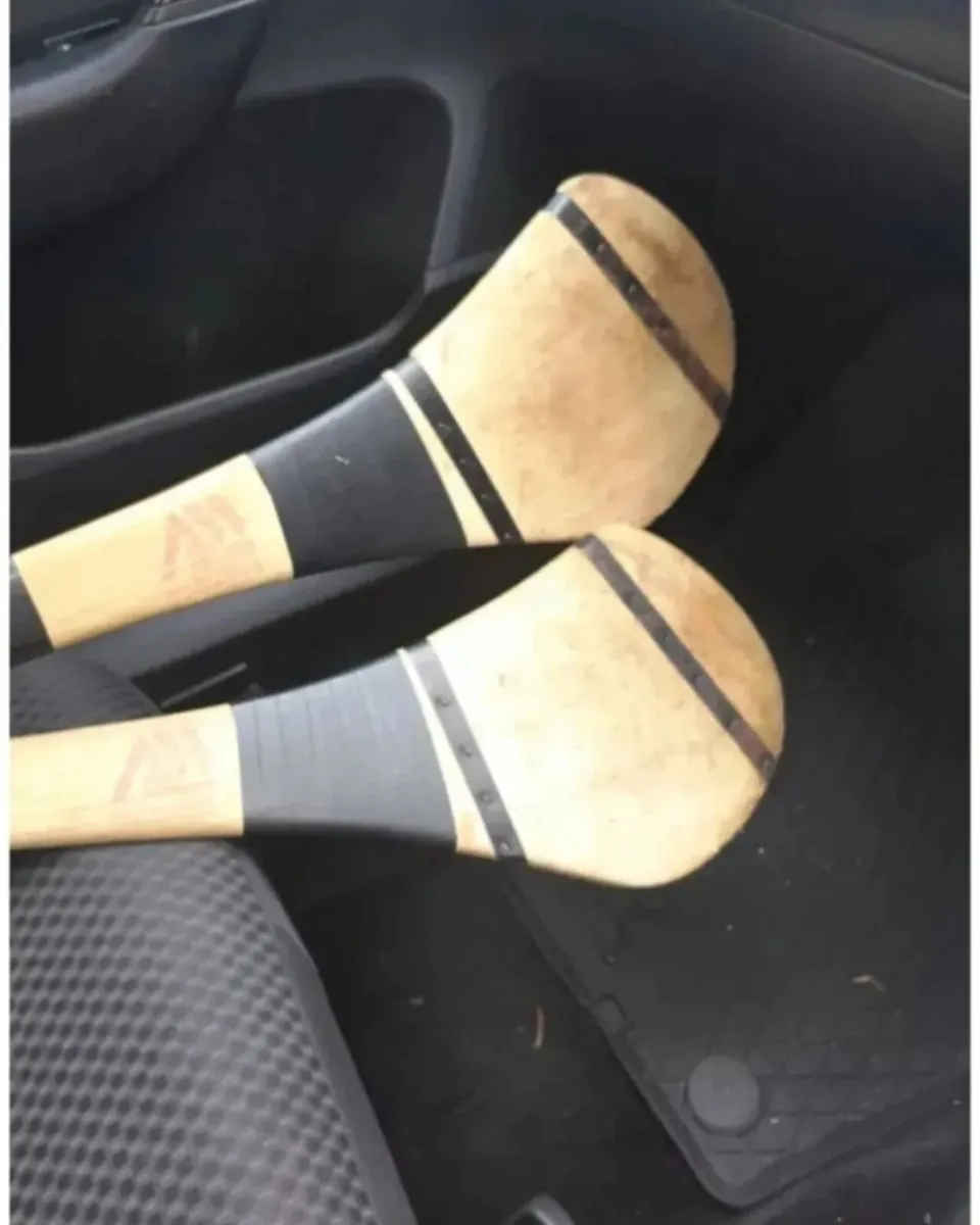 Two 35 inch hurleys - Image 1