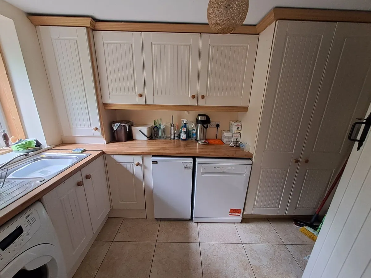 Kitchen or Utility room cabinets and counter top - Image 1