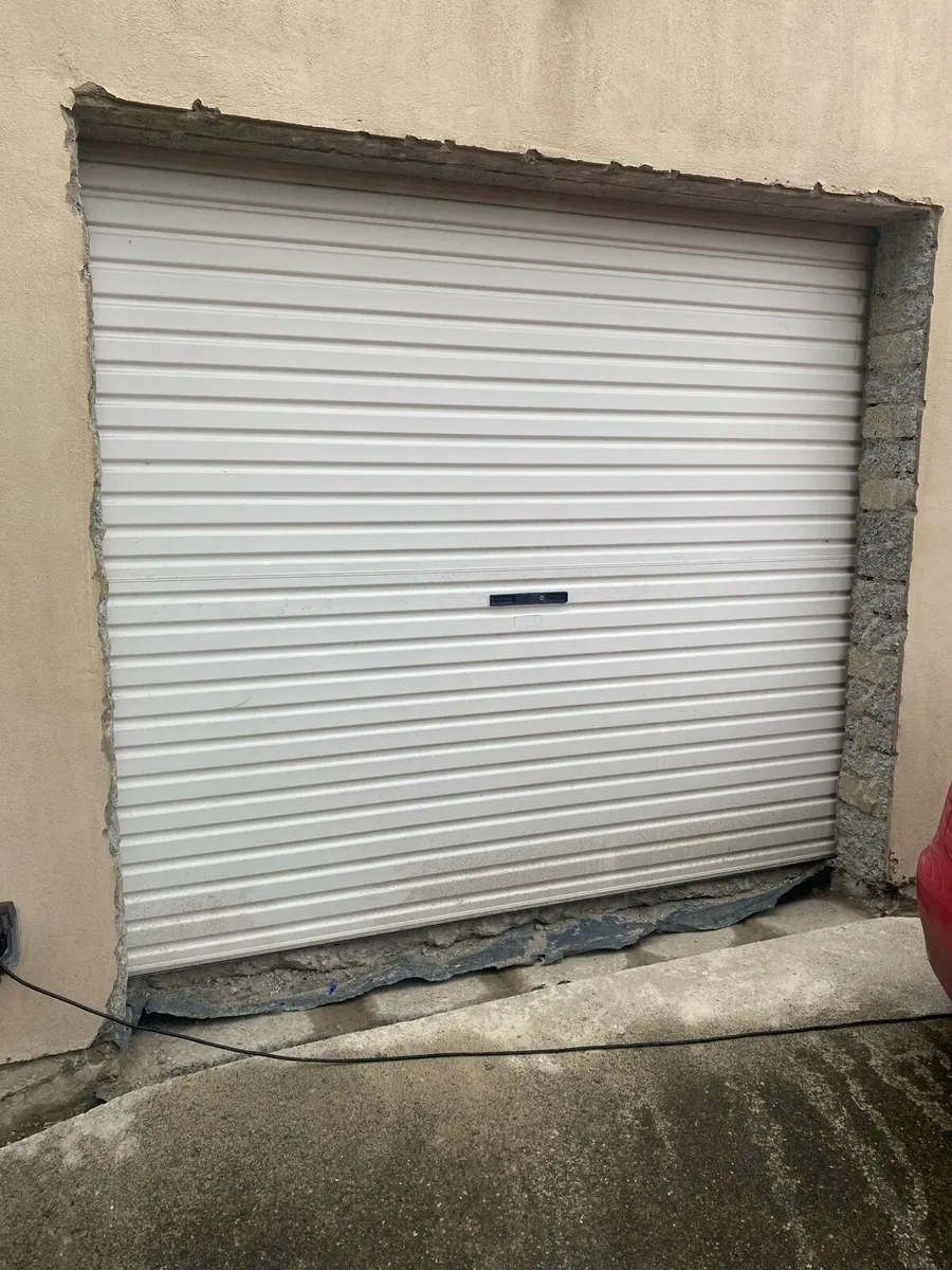 White roller door with electric motor - Image 1
