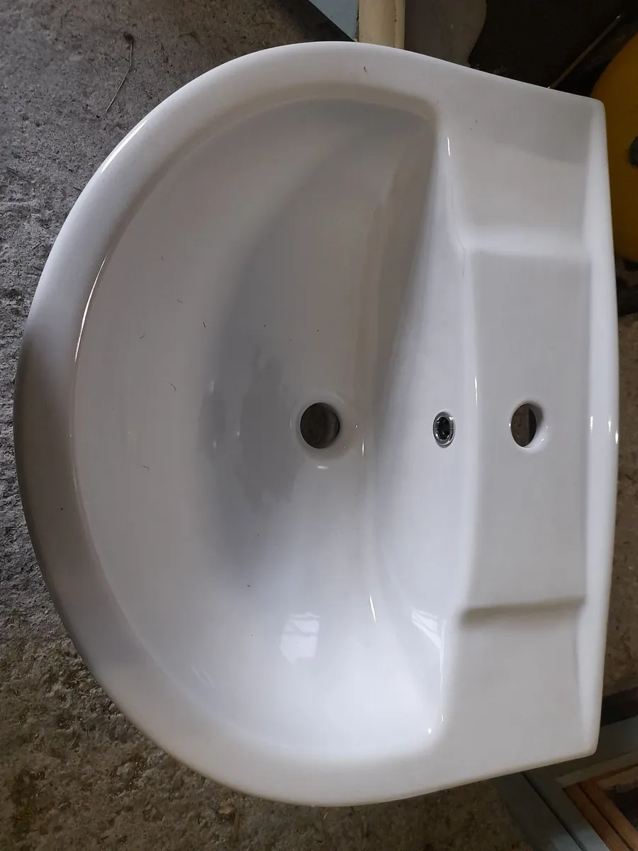 Bathroom sink and toilet - Image 2