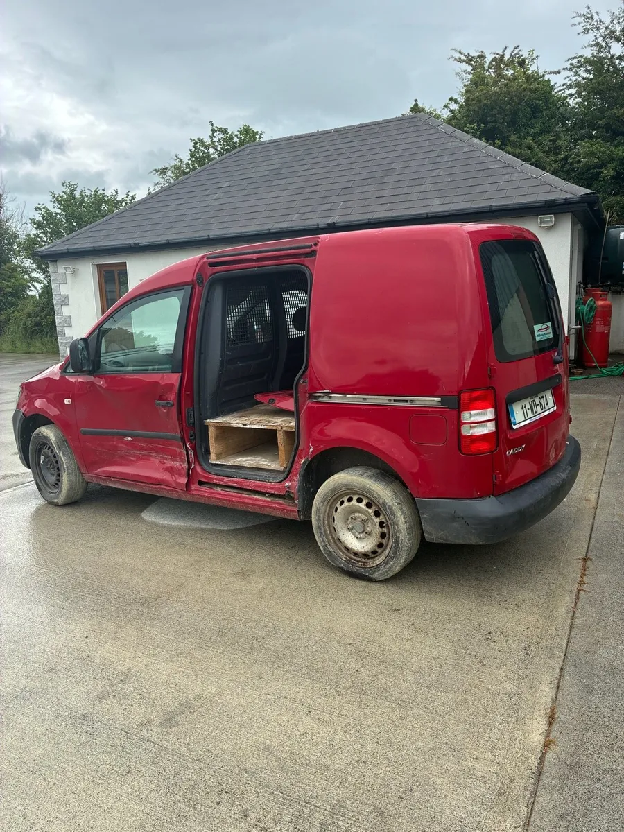 Damaged caddy van - Image 2