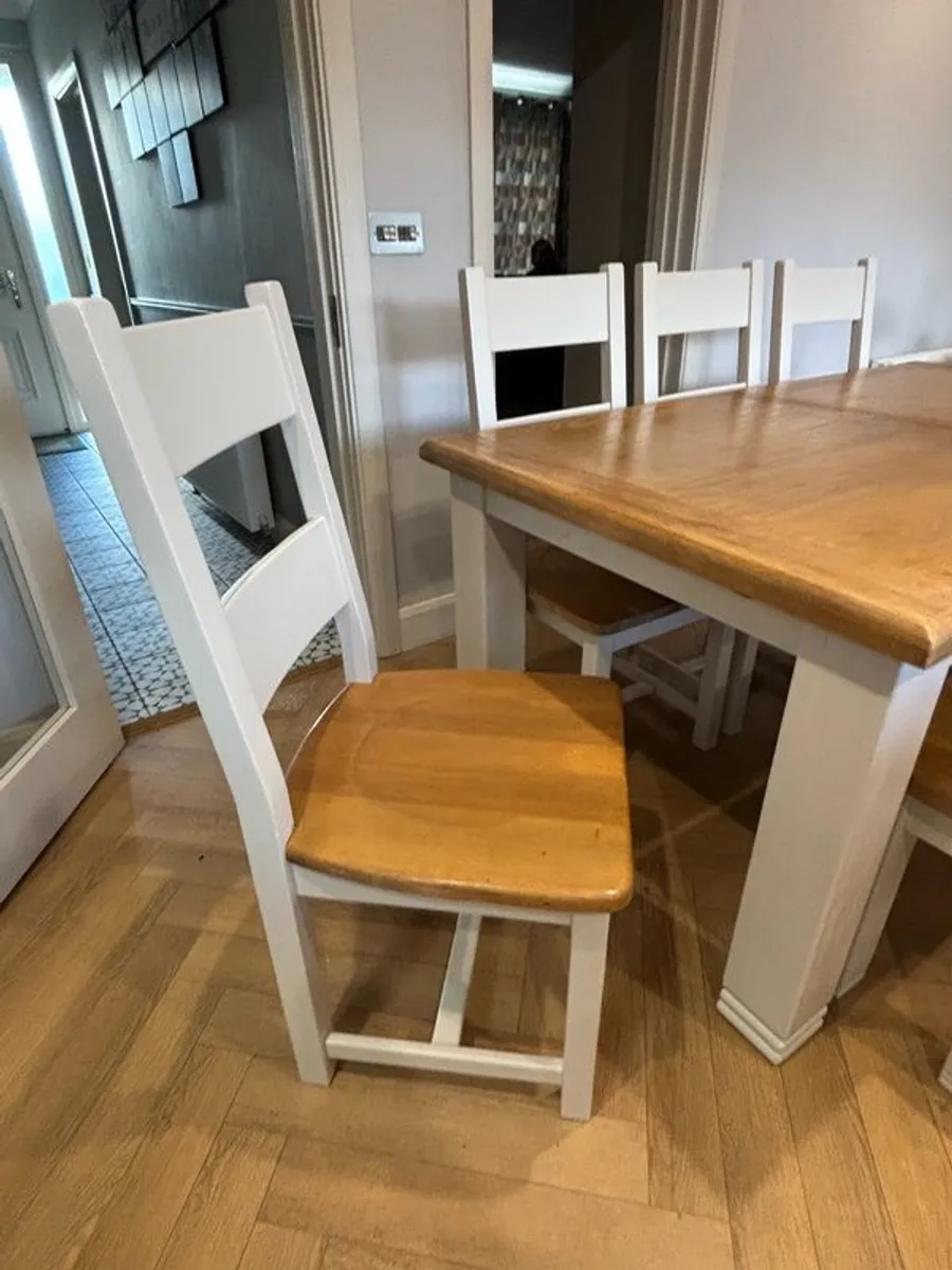 Large extendable 8 seater table with 5 chairs and a bench - Image 2